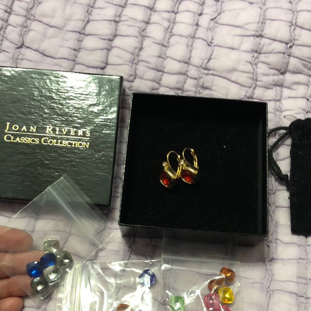 Joan Rivers lever back gold tone earrings with 10 interchangeable crystals.